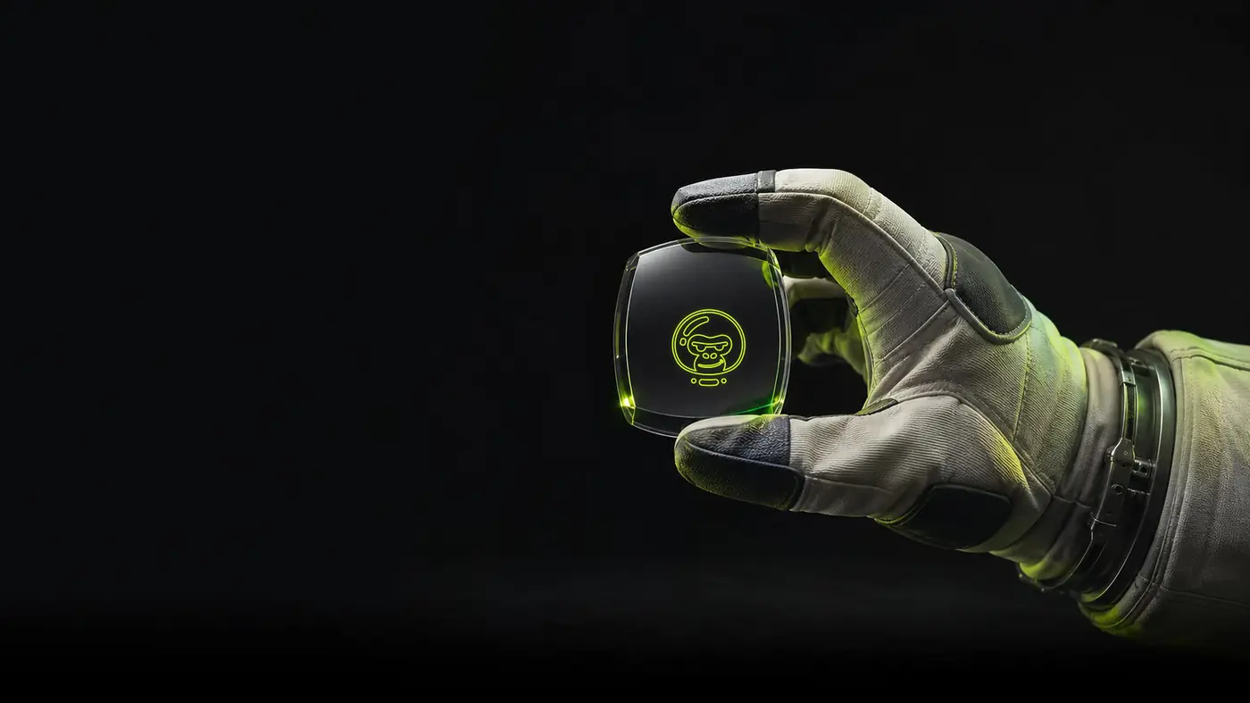 Astronaut hand holding Artchunk device